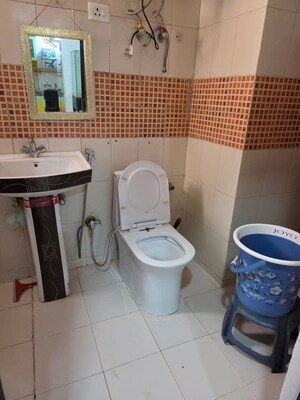 Bathroom in 3 BHK Apartment at Emenox Brave Hearts, Raj Nagar Extension – for Rent