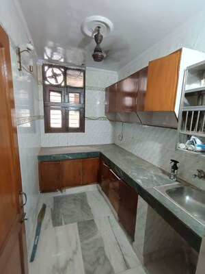 Kitchen in 2 BHK Builder Floor at Khirki Extension – for Rent