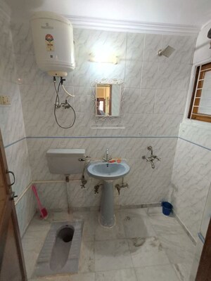 Bathroom in 2 BHK Builder Floor at Khirki Extension – for Rent