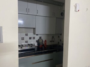 Kitchen in 2 BHK Apartment at Eureka Diya Green City, Raj Nagar Extension – for Rent