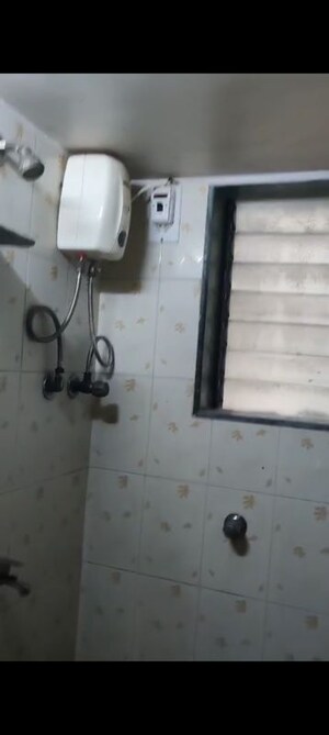 Bathroom in 1 BHK Apartment at Tilak Nagar – for Rent
