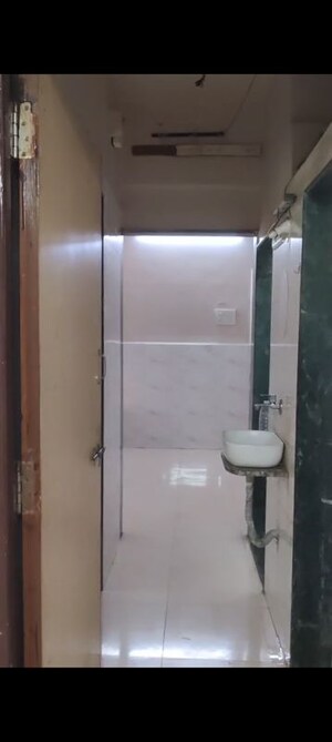 Bathroom in 1 BHK Apartment at Tilak Nagar – for Rent