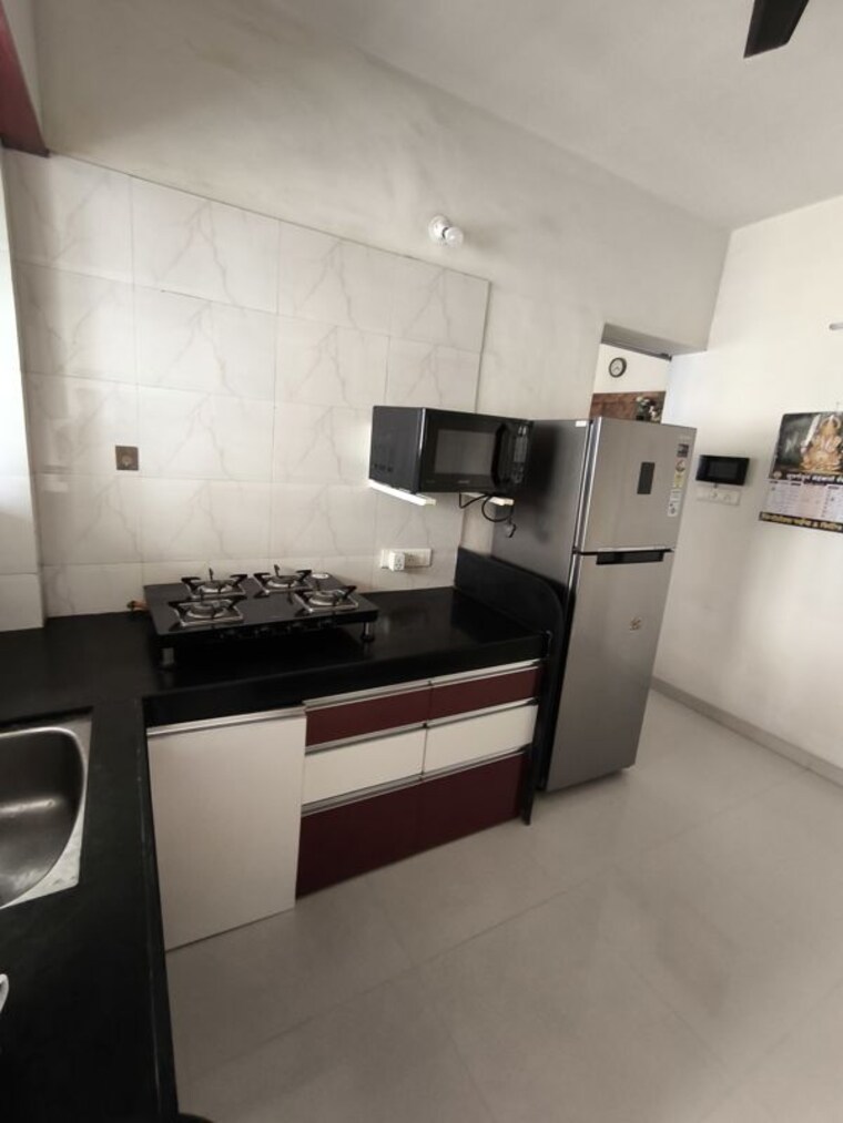 Kitchen, sai-life-style 2 Bedroom 1050 Sq.Ft. Apartment In Dhanori Pune 10744376