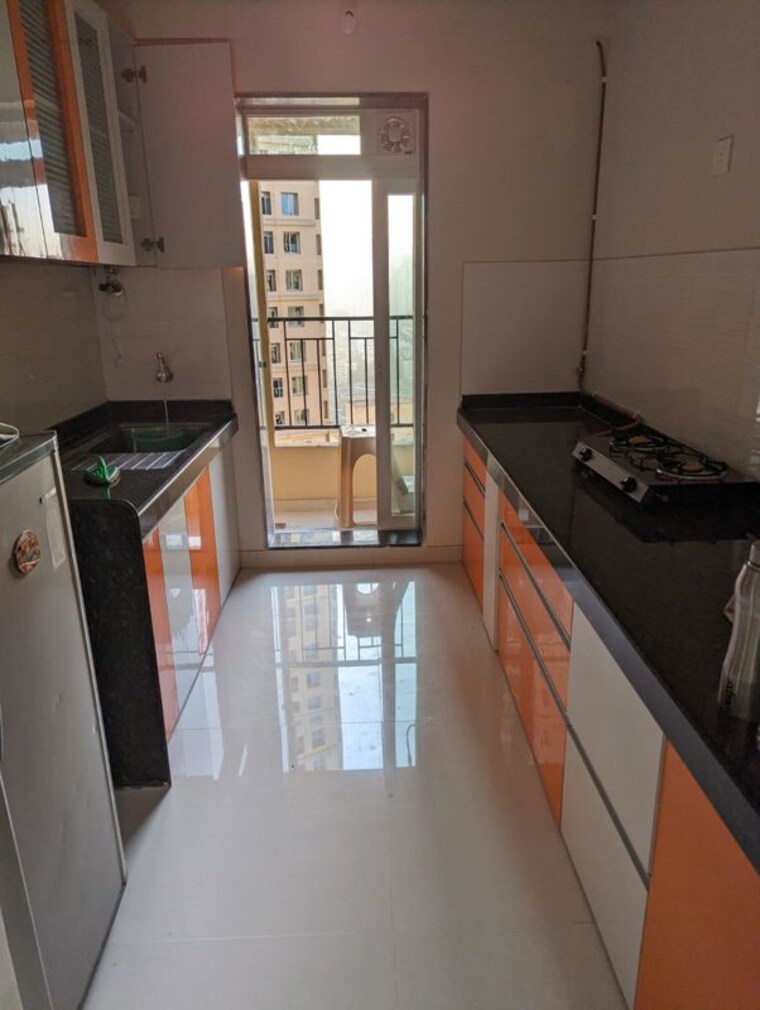 Kitchen, rustomjee-azziano-wing-i 2 Bedroom 647 Sq.Ft. Apartment In Thane West Thane 10744389