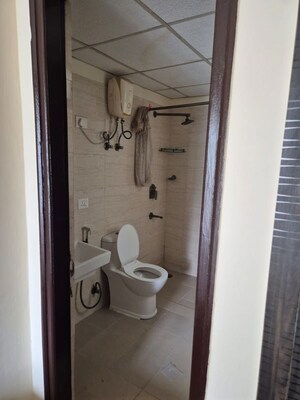 Bathroom in 2 BHK Apartment at Nimbus The Hyde park, Sector 78 – for Rent