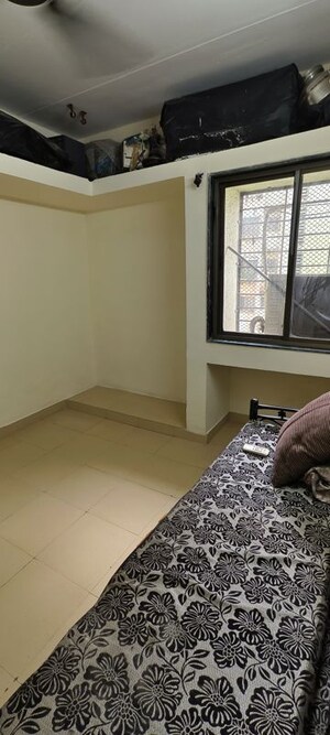 Bedroom in  Apartment at Swapnapurti CHS Kharghar, Kharghar – for Rent