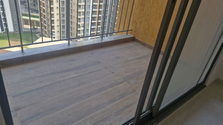 Balcony, pride-world-city-wellington 2 Bedroom 1050 Sq.Ft. Apartment In Charholi Budruk Pune 10744688