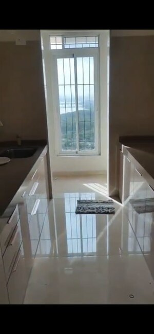 Kitchen in 2.5 BHK Apartment at Dosti Tulip, Balkum Pada – for Rent