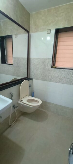 Bathroom in 2 BHK Apartment at Crystal Garden Estate CHS, Manpada – for Rent