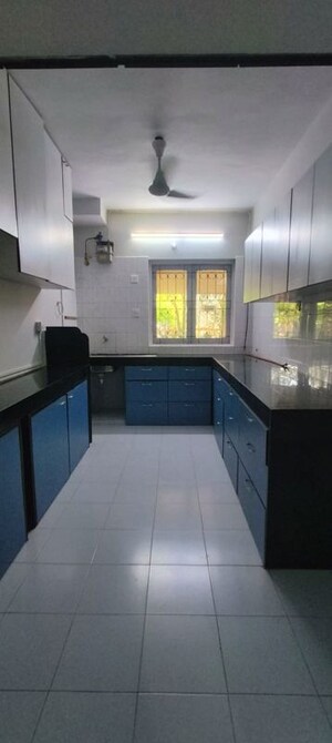 Kitchen in 2 BHK Apartment at Crystal Garden Estate CHS, Manpada – for Rent