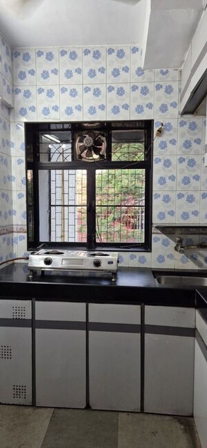 Kitchen in 1 BHK Apartment at Raheja Twp – for Rent