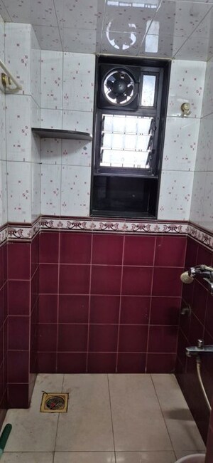 Bathroom in 1 BHK Apartment at Raheja Twp – for Rent