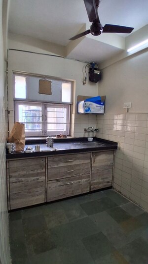 Kitchen in 1 BHK Apartment at Panchavati Gardens, Malad East – for Rent