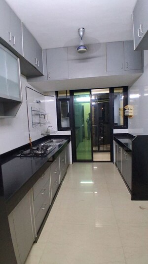 Kitchen in 2 BHK Apartment at Atul Blue Mountains, Malad East – for Rent