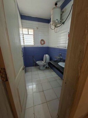 Bathroom in 4 BHK Apartment at Manikchand Malabar, Lulla Nagar – for Rent