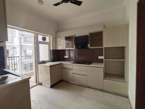 Kitchen in 3.5 BHK Builder Floor at Central Park Flower Valley, Sohna Sector 33 – for Rent