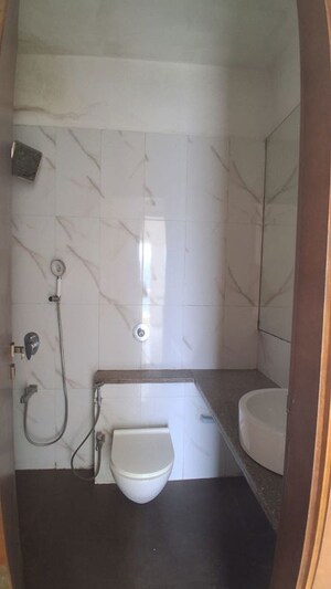 Bathroom in 3 BHK Apartment at Omkar Alta Monte, Malad East – for Rent