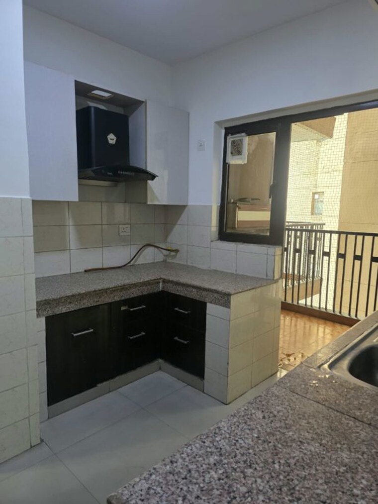Kitchen, logix-blossom-county 3 Bedroom 1675 Sq.Ft. Apartment In Sector 137 Noida 10745074