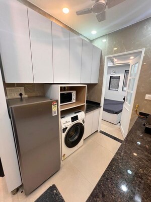 Team Area in Studio Apartment at DLF Capital Greens Phase I And II, Moti Nagar – for Rent