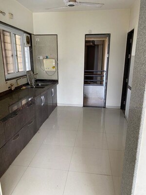 Kitchen in 2 BHK Apartment at Rising Landscapes, Mohammadwadi – for Rent
