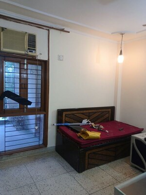 Bedroom in 2 BHK Builder Floor at Kalkaji – for Rent