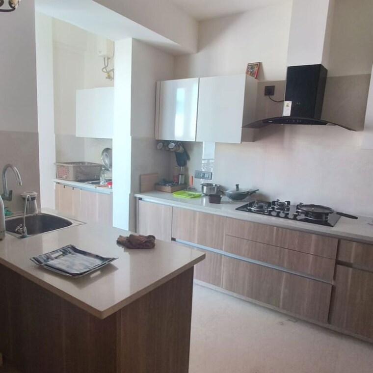 Kitchen, ansal-esencia-amara-villas 3 Bedroom 2700 Sq.Ft. Apartment In Sector 67 Gurgaon 10745597