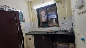 Kitchen in 2 BHK Apartment at Suncity Heights, Seawoods – for Rent