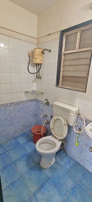 Bathroom in 1 BHK Apartment at Bhoomi Park II, Malad West – for Rent