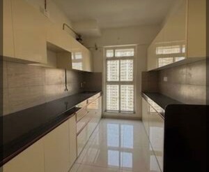 Kitchen in 3 BHK Apartment at Godrej Emerald, Ghodbunder Road – for Rent