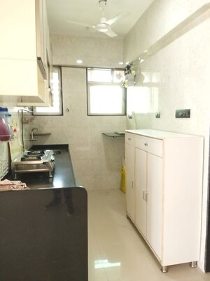 Kitchen in 2 BHK Apartment at Laxmi Vihar Khar, Khar West – for Rent