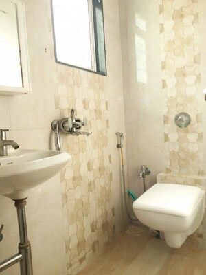 Bathroom in 2 BHK Apartment at Laxmi Vihar Khar, Khar West – for Rent