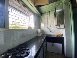 Kitchen in 2 BHK Apartment at Aundh Gaon – for Sale