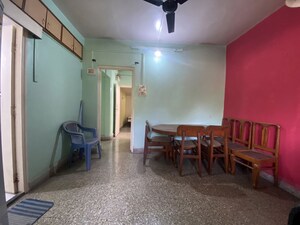 Living Room in 2 BHK Apartment at Aundh Gaon – for Sale