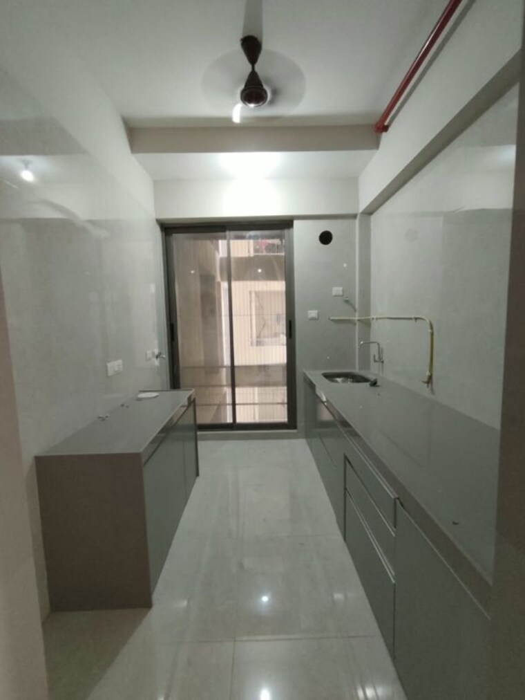 Kitchen, cllaro-urban-grandeur 2 Bedroom 714 Sq.Ft. Apartment In Mira Road Thane 10745519
