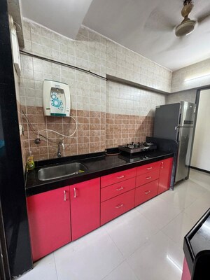 Kitchen in 2 BHK Apartment at Jaydeep Park, Majiwada – for Rent