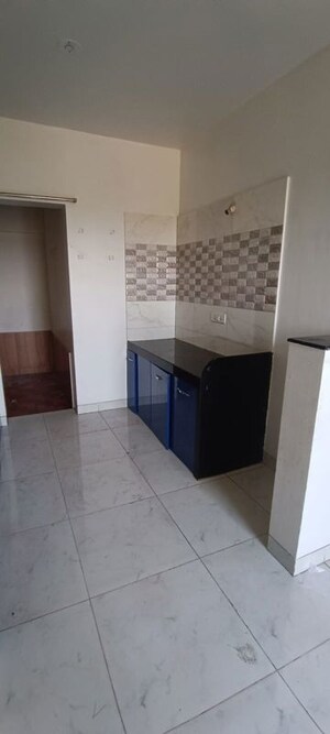 Kitchen in 2 BHK Apartment at Vijaylaxmi River Residency, Chikhali – for Sale