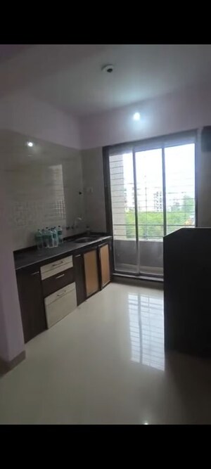Kitchen in 2 BHK Apartment at Shankar Kripa CHS , Dombivli West – for Rent