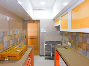 Kitchen in 2 BHK Apartment at Ani Anu Sri Balaji Enclave, Malad West – for Sale