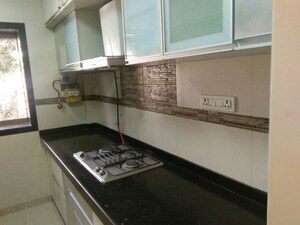 Kitchen in 2 BHK Apartment at Fabian Apartment, Bandra West – for Sale