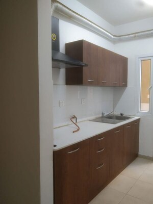 Kitchen in 2 BHK Apartment at Bhartiya Nikoo Homes, Thanisandra Main Road – for Rent
