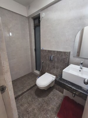 Bathroom in 2 BHK Apartment at Raj Infinia, Malad West – for Rent