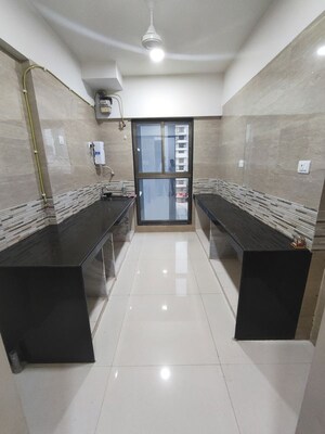 Kitchen in 2 BHK Apartment at Raj Infinia, Malad West – for Rent