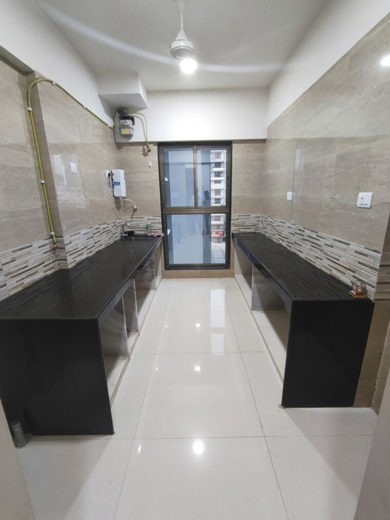 Kitchen, raj-infinia 2 Bedroom 750 Sq.Ft. Apartment In Malad West Mumbai 10746149
