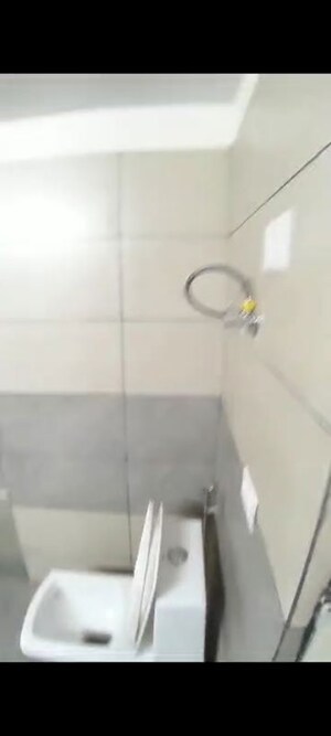 Bathroom in 3.5 BHK Apartment at JKG Palm Resort, Raj Nagar Extension – for Rent
