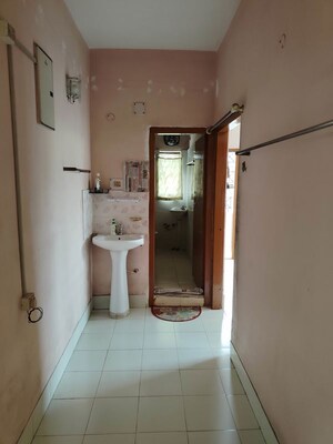 Bathroom in 3 BHK Apartment at Birubari – for Sale