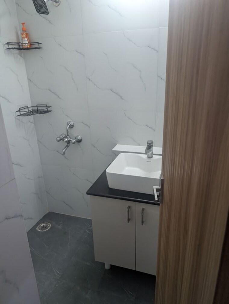 Bathroom, jaypee-greens-kosmos 2 Bedroom 938 Sq.Ft. Apartment In Sector 134 Noida 10724807