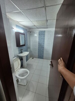 Bathroom in 2.5 BHK Apartment at Aims Golf City, Sector 75 – for Rent