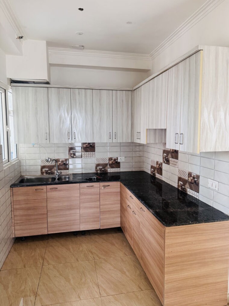 Kitchen, gaur-yamuna-city-16th-park-view 3 Bedroom 1375 Sq.Ft. Apartment In Gaur Yamuna City Greater Noida 10746391