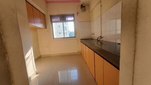 Kitchen in 1 BHK Apartment at Shubharambh Complex, Manpada – for Sale