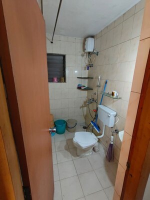 Bathroom in 2 BHK Apartment at Rajanigandha Upvan, Gawand Baug – for Rent